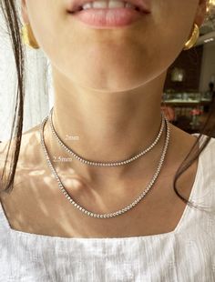 Our Adaline diamond tennis necklace is a statement of timeless luxury. Whether worn alone or layered with other pieces, it adds a touch of sparkle to any outfit, from everyday ensembles to formal occasions. Its simple yet dazzling design makes it a versatile accessory, perfect for celebrating life's special moments.