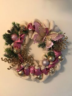 a christmas wreath is hanging on the wall