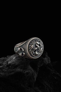 Bring a touch of mythological elegance to your style with this stunning Japanese Dragon Silver Mythology Ring. Crafted from high-quality 925 sterling silver, this biker ring features intricate details of a Japanese dragon coiled around the band. This stackable ring is perfect for men who love biker or mythological style, and is also an excellent choice for women who want a bold and unique statement piece. The high-quality construction of this handmade jewelry ensures that it is both durable and Dragon Signet Ring, Men’s Wedding Rings Dragon, Dragon Design Ring Jewelry For Gift, New Titanium Dragon Ring, Collectible Dragon Design Ring, Collectible Dragon Design Jewelry Ring, Oxidized Silver Rings, Handmade Wooden Boxes, Dragon Ring