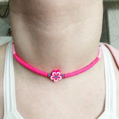 This item is ready to ship! Customization is NOT available for this listing. If you would like something custom, please send me a message! These Surfer Girl Flower Chokers are brand new & perfect for summer! They are 13in long and come with an optional 2in extender for the perfect fit! They're water resistant, but not recommended for extended wear in water. All of my friendship bracelets are made with 100% cotton embroidery floss & my water proof jewelry is made with 100% waxed polyester Adjustable Heishi Beads Choker For Beach, Adjustable Multicolor Choker For Beach, Beach Choker With Colorful Round Beads, Green Colorful Beads Choker For Beach, Surfer Choker Necklaces, Wax Cord Bracelet, Surf Jewelry, Adjustable Knot, Girl Flower