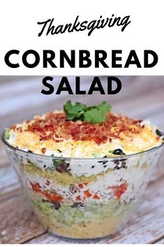 thanksgiving cornbread salad in a glass dish on a wooden table with text overlay