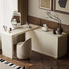 a white desk with a mirror on top of it next to a chair and rug