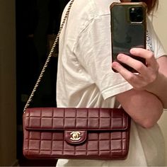 Gorgeous Chanel Chocolate Bar Bag. Burgundy With Gold Chain. Lightly Used. In Great Shape. Vintage Chanel Are Extremely Well Made. This Style Of Bag Is Very In Style. Chanel Chocolate Bar Bag, Vintage Chanel Bag, Bags Vintage, Chanel Bags, East West, Vintage Chanel, Burgundy Color, Chocolate Bar, Chanel Bag