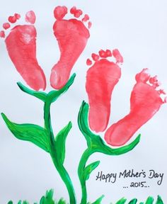 a mother's day card with two feet and flowers