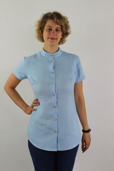 "Write the selected color in the message Handmade sky blue linen blouse with front buttons and short sleeves, mandarin collar, perfect for casual wear and suitable for any occasion in any season Details: - 100% natural linen produced in Europe ; - medium weight (180 gram per square meter); - color: sky blue, could be any from our colors catalog (color samples at the photo); Made to order, approximately a few days, If you have any questions please message me and I will be glad to answer. Size gui Natural Fiber Clothing, Mandarin Collar Shirt, Color Catalog, Lovely Tops, Summer Linen, Linen Blouse, Square Meter, Color Samples, Linen Top