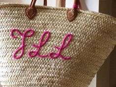 "personalize your beach bag basket with your names/words FREE STANDARD SHIPPING TO USA EUROPE AND CANADA for all my items 20% DISCOUNT for 5 or more bags hand embroidered by me and personalised with your name, initiails, words of your choise You can choose different colours for your writing SPECIAL PRICE FOR WHOLESALE OR BRIDE PARTY MORE PERSONALIZED BAGS IN MY SHOP: https://www.etsy.com/your/shops/StrawBasketsMorocco/tools/listings/section:24635994 HANDLES : ♧long leather handles ♧short straw h Pink Beach Bag With Leather Handles, Summer Bags With Leather Handles As Gift, Summer Bags With Leather Handles For Gift, Personalized Pink Bag For The Beach, Personalized Pink Beach Bag, Pink Straw Bag With Leather Handles For Beach, Personalized Tote Bag For Beach, Personalized Tote Bag For Summer, Personalized Beach Bags