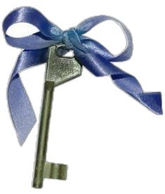 a key with a blue ribbon tied around it