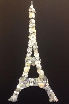 the eiffel tower made out of buttons