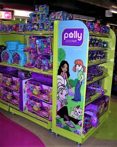 there are many toys on display in the store for kids to play with and learn