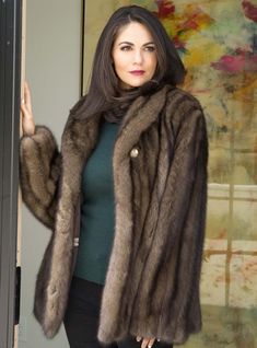 Handcrafted from the finest Russian sable fur in our fur factory in Alabama, this jacket is the perfect piece for anyone searching for the most luxurious fur jacket. It has hook and eye snap closures, side pockets and is fully lined. This fur is custom-made, please allow approximately 2-6 weeks for delivery. For questions or rush orders, please use our chat or call 334-277-7610. We can also have our furriers add a detachable fur hood to this style, please contact us for a quote. Length: 28 inche Russian Sable, Sable Coat, Sable Fur Coat, Fur Coat Fashion, Chinchilla Fur, Fur Coat Vintage, Mink Fur Coat, Vintage Fur, Fur Hood