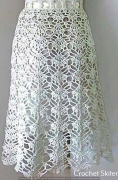 a white lace dress on a mannequin