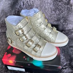 Ash Gold Vava Starboss High Top Sneaker Size 12 (Euro 30) New In Box Your Little Diva Will Love These Star-Studded High-Top Sneakers. An Inside Zip And Adjustable Buckled Straps Makes Them Easy To Slip On. Perforated Leather/Rubber/Canvas/Padded Foot Bed. Distressed Toe Cap. Gold High-top Sneakers With Round Toe, Casual Silver High-top Sneakers With Round Toe, Silver Leather Party Sneakers, Silver Party Sneakers With Studded Outsoles, Silver High-top Party Sneakers, Silver High-top Sneakers For Party, Ash Shoes, Perforated Leather, Star Studs