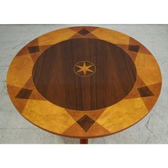 a wooden table with a star on it