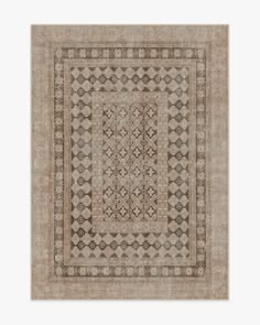 a beige and black rug with an intricate design on the middle, in front of a white background