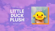 a little duck plush toy is held up in the air