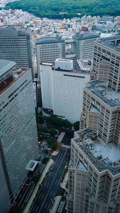 an aerial view of some very tall buildings