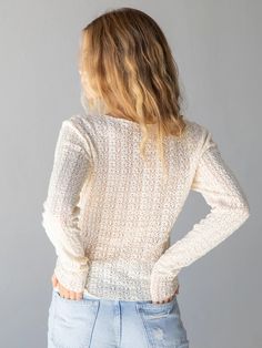 It’s the perfect layering top but it’s so flattering that we love wearing it unlayered with a printed skirt! Chic Cream V-neck Crochet Top, Casual Long Sleeve Lace Top, Spring Lace Top With Lace Trim For Day Out, White Lace Top For Fall, White Lace Tops For Fall, White Casual Lace Top For Fall, Casual Long Sleeve Lace Trim Top, Casual White Lace Top For Fall, Spring V-neck Top With Scalloped Lace