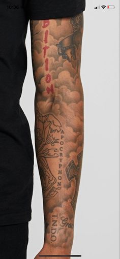 a man's arm with tattoos on it and the words tattoo written in red ink