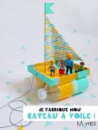 a toy boat with people in it on a white background and the words je fabrique mon bateau avolle mes