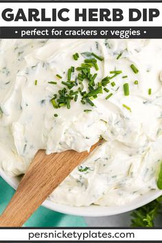 a white bowl filled with garlic herb dip