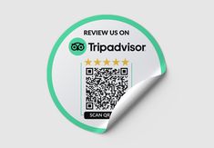 a green and white sticker that says review us on tripadvisor with qr code