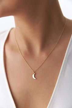 Our new delicate crescent moon necklace crafted with gleaming 14k gold. The perfect fine necklace for a minimal elegant touch. ★ Necklace Features • Gold Karat: 14K/18K Solid Gold (All pieces are stamped for authenticity)• Gold Colors Available: Yellow Gold, White Gold, Rose Gold• Pendant Dimensions: 12.3 mm by 7.7 mm / 0.48 Inch by 0.30 Inch Fine Necklace, Gold Moon Necklace, 14k Yellow Gold Necklace, Crescent Moon Pendant, Yellow Gold Necklace, Moon Pendant Necklace, Gold Colors, Necklace Craft, Rose Gold Pendant