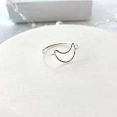 Cute crescent moon ring handmade in 925 sterling silver. This ring is perfect to wear alone or with a stackable ring. It is also beautiful as a midi ring. Beautiful gift for a special day. Gift for girls, for mom, for daughter, wife, grandmother, friend, girlfriend or an important person. It is ideal gift for birthday, anniversary, mother's day, Christmas, bridesmaid. ♥ Item Details: Metal type: Sterling silver Karat / purity: 925. Moon dimensions: 8.8 x 11.8mm The ring is 100% handmade. Each ri Minimalist Open Ring With Moon Charm, Minimalist Moon Charm Open Ring, Minimalist Crescent Moon Charm Ring, Minimalist Adjustable Rings With Moon Charm, Minimalist Adjustable Ring With Moon Charm, Minimalist Rings With Moon Charm For Gifts, Minimalist Moon Charm Rings For Gifts, Minimalist Moon Charm Rings As Gift, Minimalist Moon Phase Open Ring Jewelry