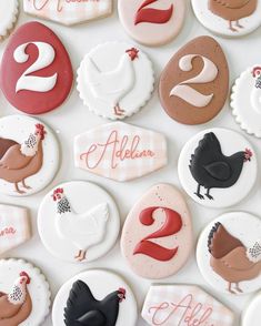 decorated cookies with numbers and farm animals on them