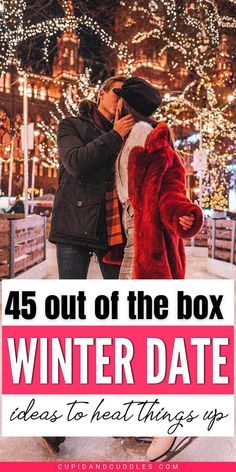 a man and woman standing next to each other in front of christmas lights