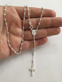 "925 sterling silver italian rosary 20\" long . for protection and good luck made in italy 3 mm beads gr:7.4 rosario de 925 plata esterlina -20\" largo .para proteccion y buena suerte . hecho en italia 3mm beads gr:7.4" Dainty Silver Rosary Gift, Dainty Silver Rosary As Gift, Sterling Silver White Gold Rosary As Gift, White Gold Sterling Silver Rosary As Gift, Sterling Silver Cross Rosary In Silver, Handmade Sterling Silver Rosary Bracelet, Silver Sterling Silver Cross Rosary, Spiritual Sterling Silver Rosary In Silver, Sterling Silver Rosary With Silver Beads As Gift