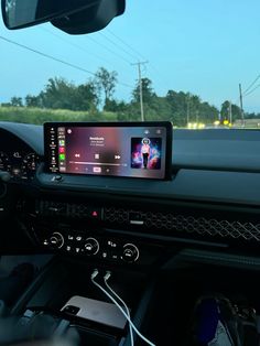 the dashboard of a car with an entertainment system