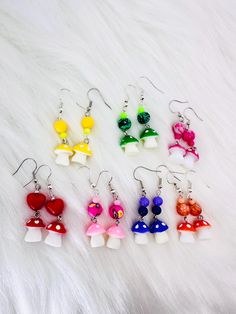 🍄Colorful Mushroom Dangle Earrings Unique Handmade Jewelry Gift for Her Cute Mushroom Jewlry Unique  Handmade Earrings Fun Gift Idea for her 🫱Handmade with 7 different colors of Mushrooms to choose from.  Makes a lovely gift! 🎁Great Gift for Bestie, Gift for Teacher, Gift for Friend, Gift for  Co-Worker, Gift for  Mother-In-Law,  Gift for Mom, Gift for Grandmother, or Gift for Boss.  Get yours today and get a free Thank you Gift with purchase!    🚫Returns or Exchanges  >We do not accept retu Fun Mushroom Design Jewelry For Gifts, Fun Mushroom Design Jewelry Gift, Handmade Multicolor Novelty Earrings, Unique Handmade Earrings, Gifts For Boss, Handmade Jewelry Gift, Unique Handmade Jewelry, Unique Earrings, Thank You Gifts