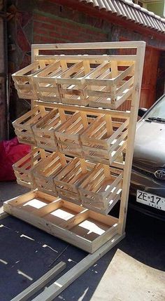 a car parked next to a wooden structure