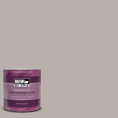 a can of behr paint on a white background