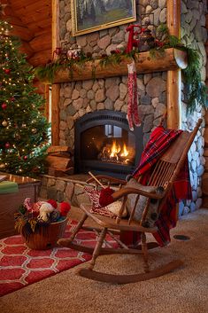 a living room with a fire place and christmas decorations