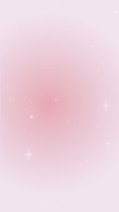 a pink background with white stars in the middle