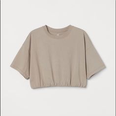 H&M Beige Crop Top With Elastic Sports Crop Top Size Small Brand New With Tag Sporty Beige Tops For Summer, Sporty Beige Top For Spring, H&m Sporty Crew Neck Tops, Sporty H&m Crew Neck Tops, H&m Cotton Tops For Loungewear, H&m Relaxed Fit Tops For Loungewear, H&m Summer Loungewear Tops, H&m Tops For Summer Loungewear, H&m Cotton Casual Crop Top