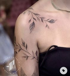 a woman with a tattoo on her arm