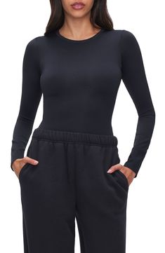 Every closet needs this staple bodysuit made from stretchy scuba fabric with a classic crewneck, long sleeves and a thong back that won't show under clothes. 28" length (size 2) Snaps between legs Crewneck Long sleeves 78% nylon, 22% elastane Machine wash, tumble dry Imported Black Owned/Founded Black Long Sleeve Bodysuit With Minimal Stretch, Stretch Elastane Bodysuit With Crew Neck, High Stretch Elastane Bodysuit With Crew Neck, High Stretch Elastane Crew Neck Bodysuit, Closet Needs, Scuba Fabric, Good American, Long Sleeve Bodysuit, Jumpsuits For Women