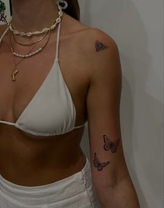 Butterfly and bee tattoo Two Butterflies Tattoo Arm, Butterfly Tricep Tattoo, Butterfly Bicep Tattoo Women, Bees And Butterflies Tattoo, Arm Small Tattoos For Women, Forearm Butterfly Tattoo Women, Tattoos For Women Butterflies, Bicep Butterfly Tattoo, Butterfly Bicep Tattoo