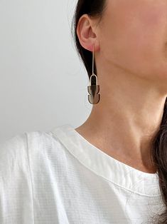 "| Double Dip Earrings | These simple, geometric earrings are made with translucent acrylic and are perfect for everyday wear. They are lightweight and comfortable and would look great with a variety of outfits. + Length: appx. 3\"h x .6\"w   + Color: bronze + Material: gold-filled, acrylic                  -------------- Made to order in the USA, please allow up to 1-2 weeks to ship. Please note that all jewelry is made to order and may vary slightly from the photograph. All jewelry is packaged in a gift box for giving or keeping. Don't forget to take a look at my shop policies before ordering for important information regarding turnaround times, shipping methods and returns." Minimalist Brass Dangle Earrings, Modern Brass Drop Earrings, Minimalist Geometric Earrings, Modern Geometric Pierced Earrings, Adjustable Minimalist Geometric Earrings, Health Design, Gold Geometric, Geometric Jewelry, Geometric Earrings