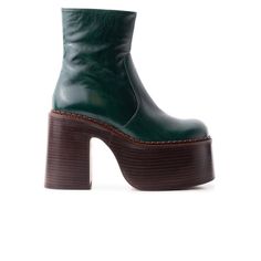 Detail(s):  Round Toe 4.5'' Platform Heel Medial Side Zipper Closure Material(s):  Leather Upper Leather Insole & Lining  Handmade in Spain Color(s):  Green Green Platform Boots, Green Platform, 70s Vibes, Green Boots, Mid Boots, How To Stretch Boots, Casual Heels, Boot Pumps, Platform Heel