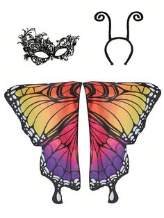 a butterfly mask and wings are shown in the shape of a butterfly with swirls on it's wings