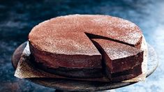 a chocolate cake with one slice cut out