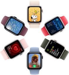 four smart watches with different designs on each watch face and the same time displayed on their screens