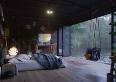 a bedroom with wooden floors and lots of plants on the wall, along with a hanging bed