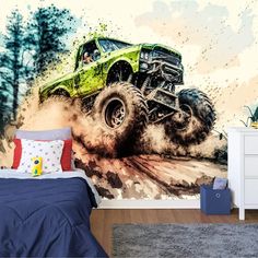 a bed room with a large wall mural and a monster truck on it's side