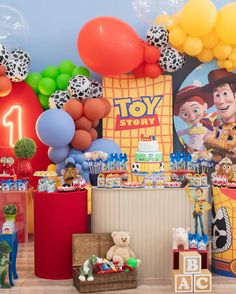 a toy story birthday party with balloons and decorations