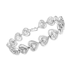 Love will be on your mind when you wear this sterling silver heart link bracelet. A polished sterling silver open heart holds inside a smaller one inlaid with glistening round cut diamonds. 15 heart links make up this 1/4ct TDW diamond bracelet that secures with a lobster claw clasp. Double Heart, Bracelet Argent, Open Heart, Small Heart, Sterling Silver Heart, Round Cut Diamond, Diamond Gemstone, High Quality Jewelry, Bracelet Sizes