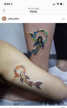 two people with tattoos on their legs and one has a fish tattoo on the leg